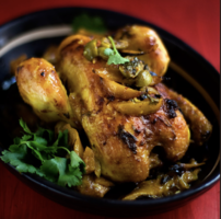 Roasted Poussin with preserved Lemons, Olives and North African Spices