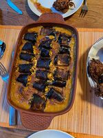 Stuffed aubergine with curry and coconut dal