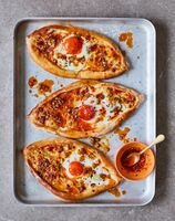 Adjaruli khachapuri with aleppo chilli and spring onion butter