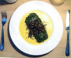 Steamed Fillets of Sea Bass in Green Jackets with Leek Coulis with Saffron and Dill