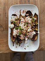 Roasted Aubergine with feta yoghurt, Aleppo chilli and pistachio